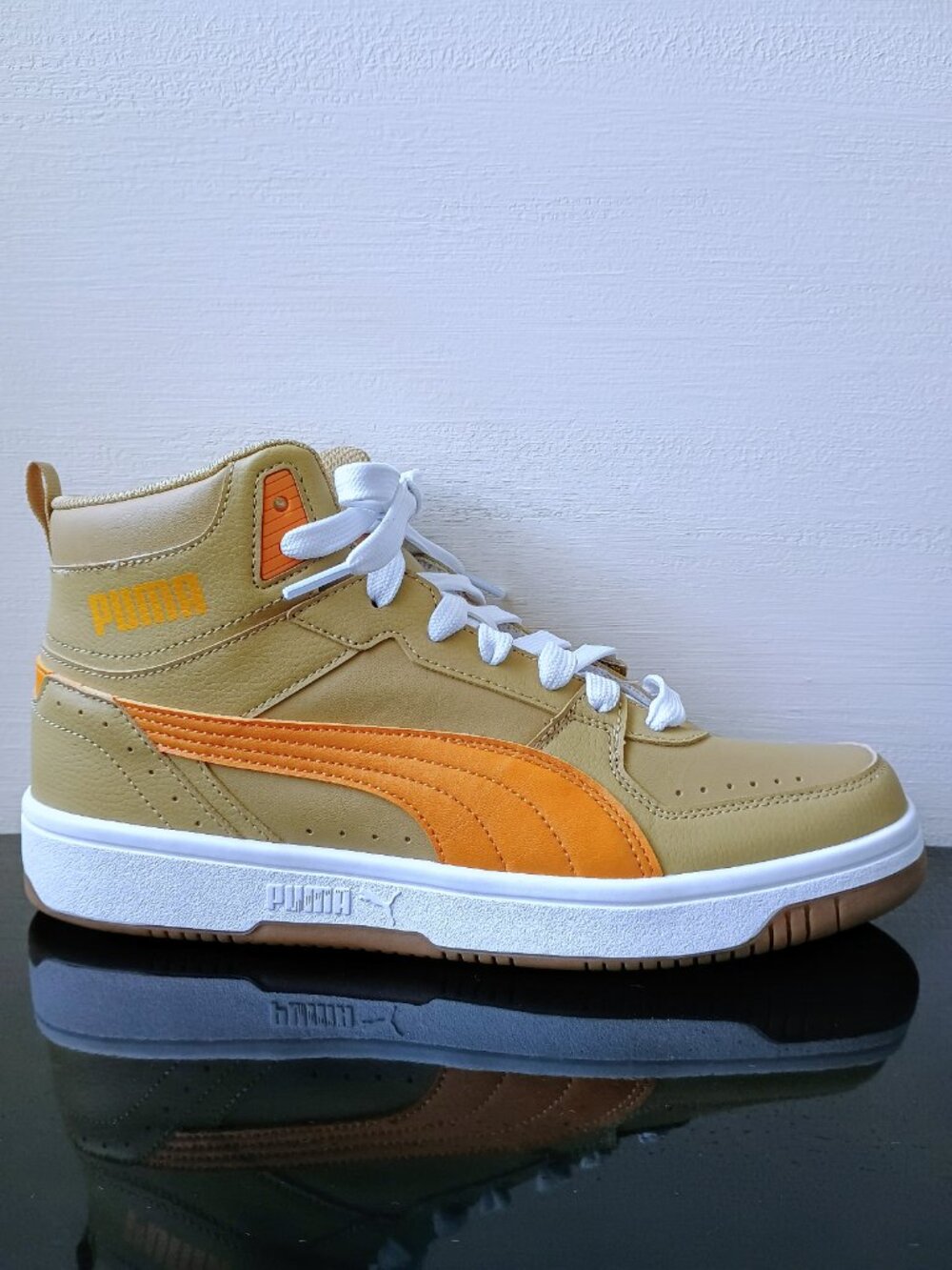 Puma Men's Rebound Joy Hi Top Sneaker in Cool & Unique Prairie Tan / Ginger Tea